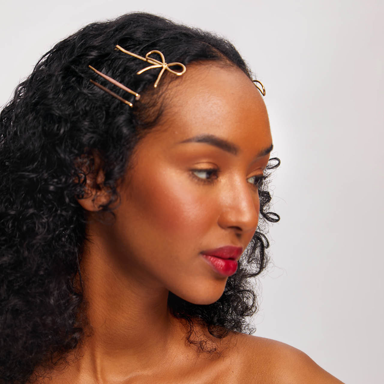 64259-MetalEnamelPuffy_BowBobbyPins-8pc-Model-Hair-Rosewood-1280x1280px_8d65cb6f-97ae-46f8-80d7-de29087282ed.jpg
